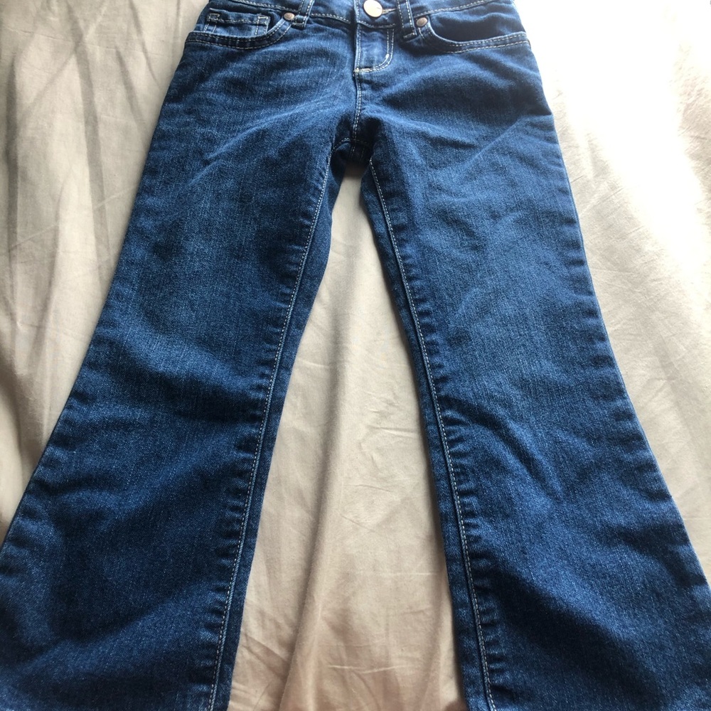 Girls bootcut jeans.
